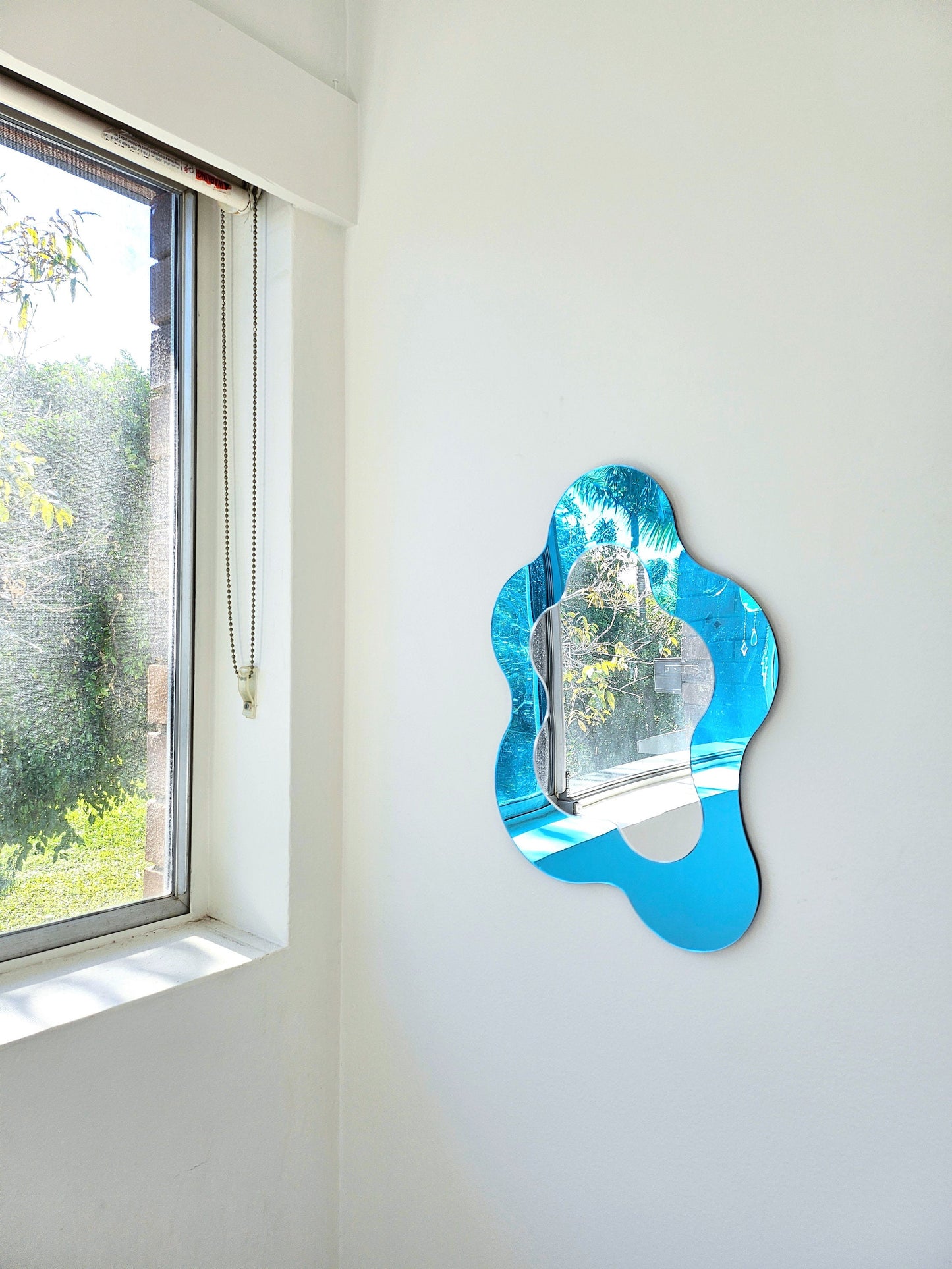 The Blue Wavy Mirror