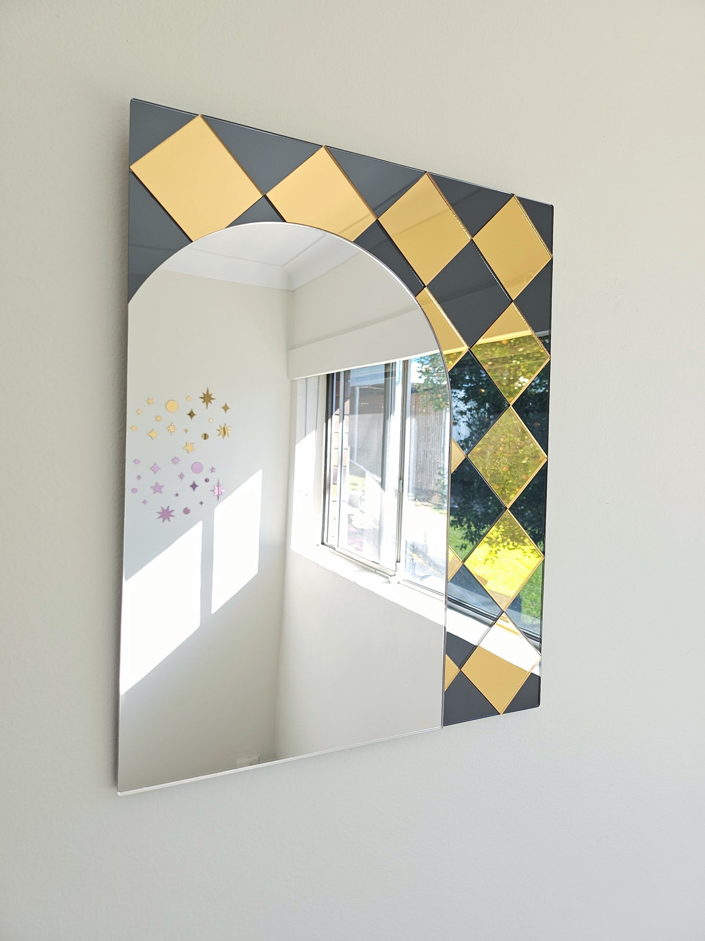 The Harlequin Noir Mirror