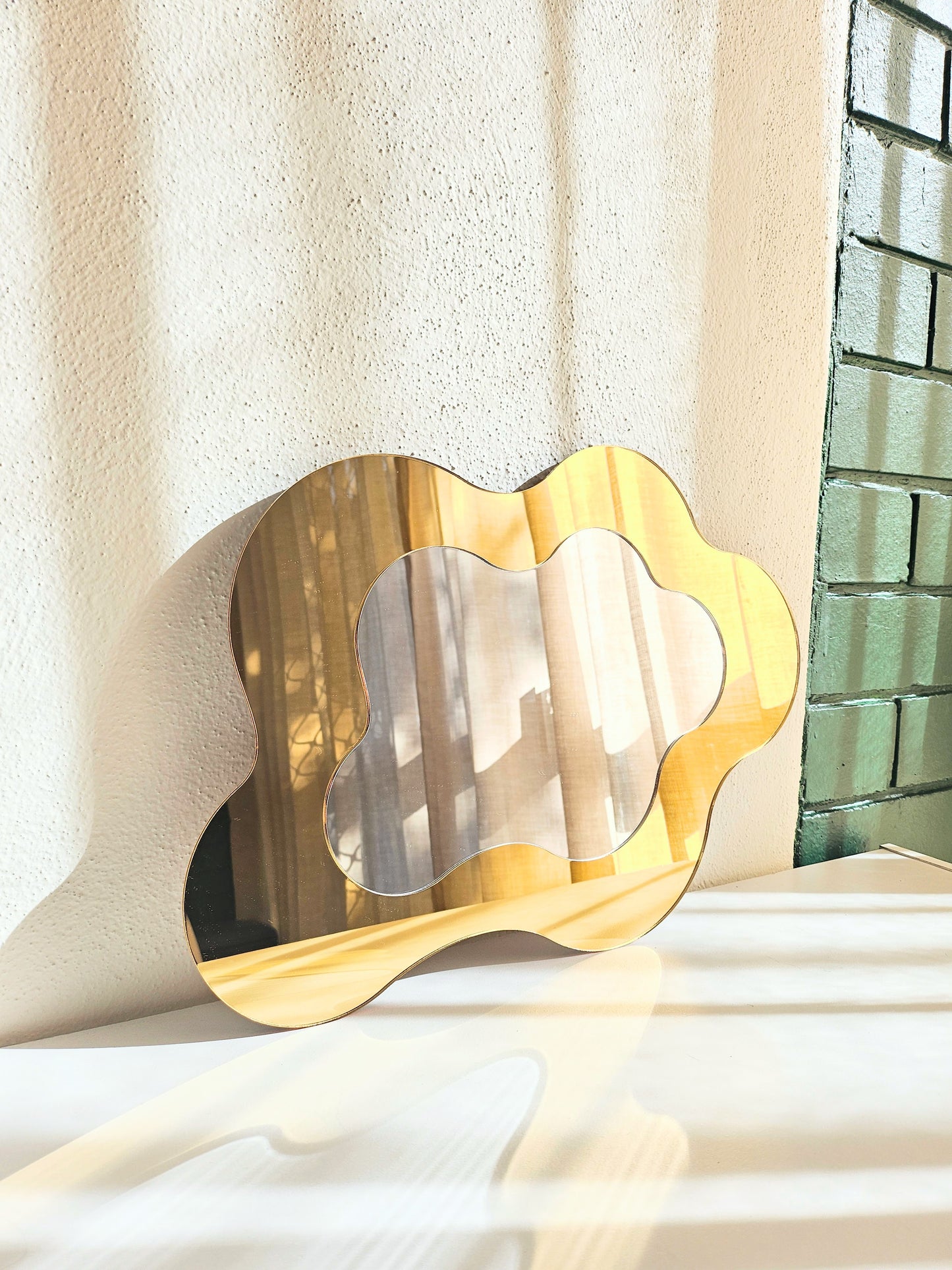 The Gold Wavy Mirror